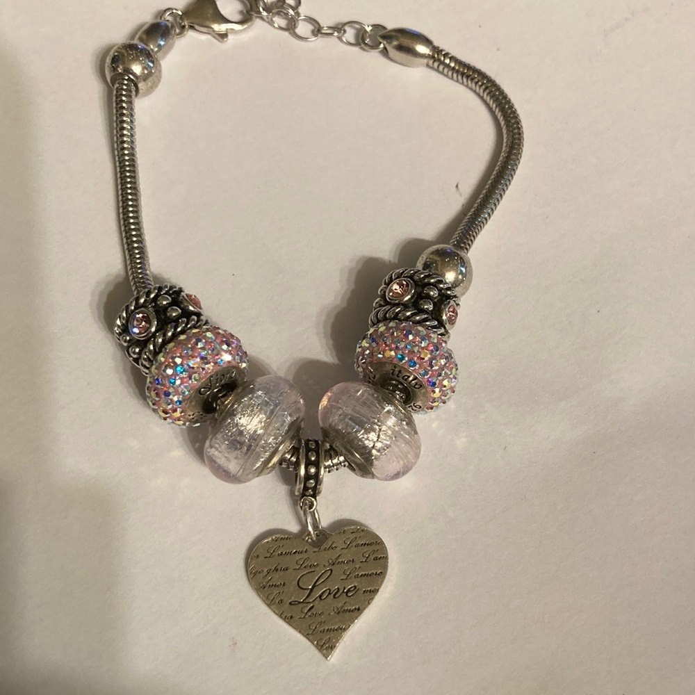 Fiona 925 beaded bracelet lots of pink tones , size shown in pictures. Extends